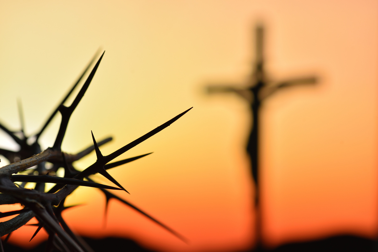 Crown of Thorns Against a Silhouette of Crucifix Copy Space